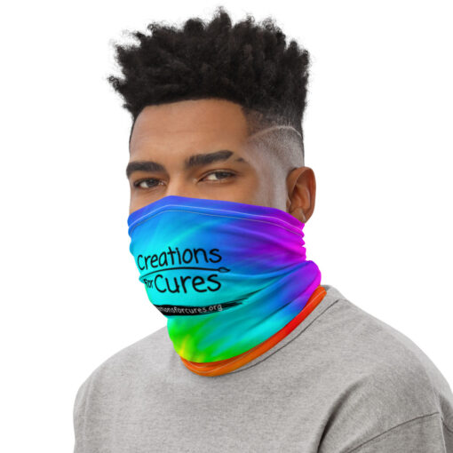 a person wearing a tie-dye gaiter featuring the Creations for Cures logo in black