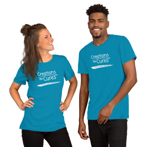 two people wearing aqua t-shirts featuring the Creations for Cures logo in white
