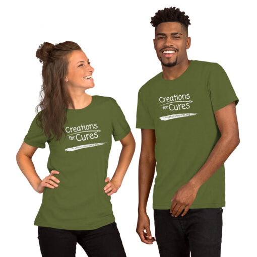 two people wearing olive t-shirts featuring the Creations for Cures logo in white