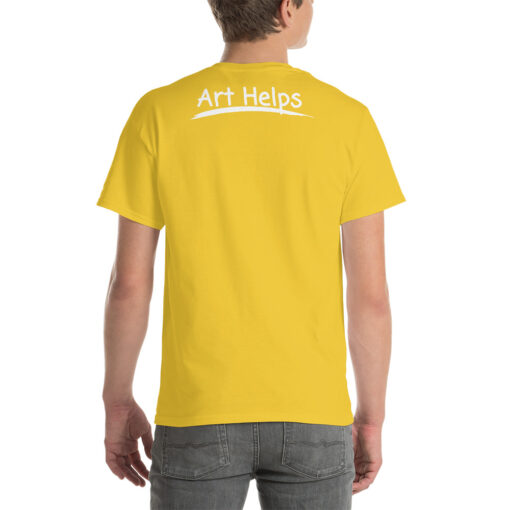 back view of a person wearing a daisy yellow t-shirt featuring the phrase "Art Helps" in white
