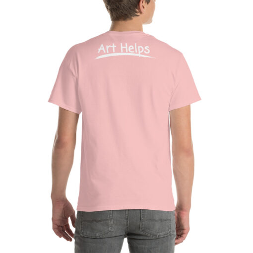 back view of a person wearing a light pink t-shirt featuring the phrase "Art Helps" in white