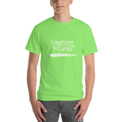 a person wearing a lime green t-shirt featuring the Creations for Cures logo in white