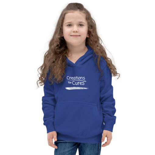 a person wearing a kids size royal blue hoodie featuring the Creations for Cures logo