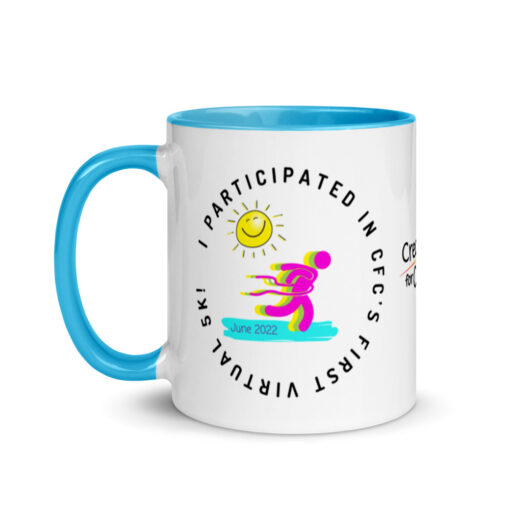 a white ceramic mug with blue handle and interior with artwork saying "I co-founded CFC's first ever virtual 5k!"
