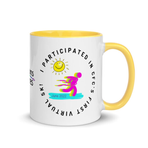 a white ceramic mug with yellow handle and interior with artwork saying "I co-founded CFC's first ever virtual 5k!"